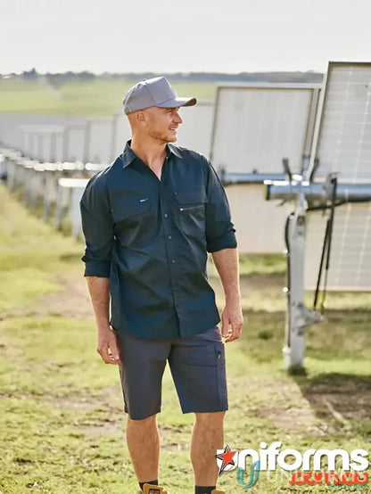Man wearing X Airflo Stretch Ripstop Vented Cargo Short for airflow and durability
