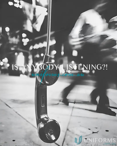 Vintage-style telephone receiver hanging by coiled cord on Yes Chef Cafe Short Apron in biz collection