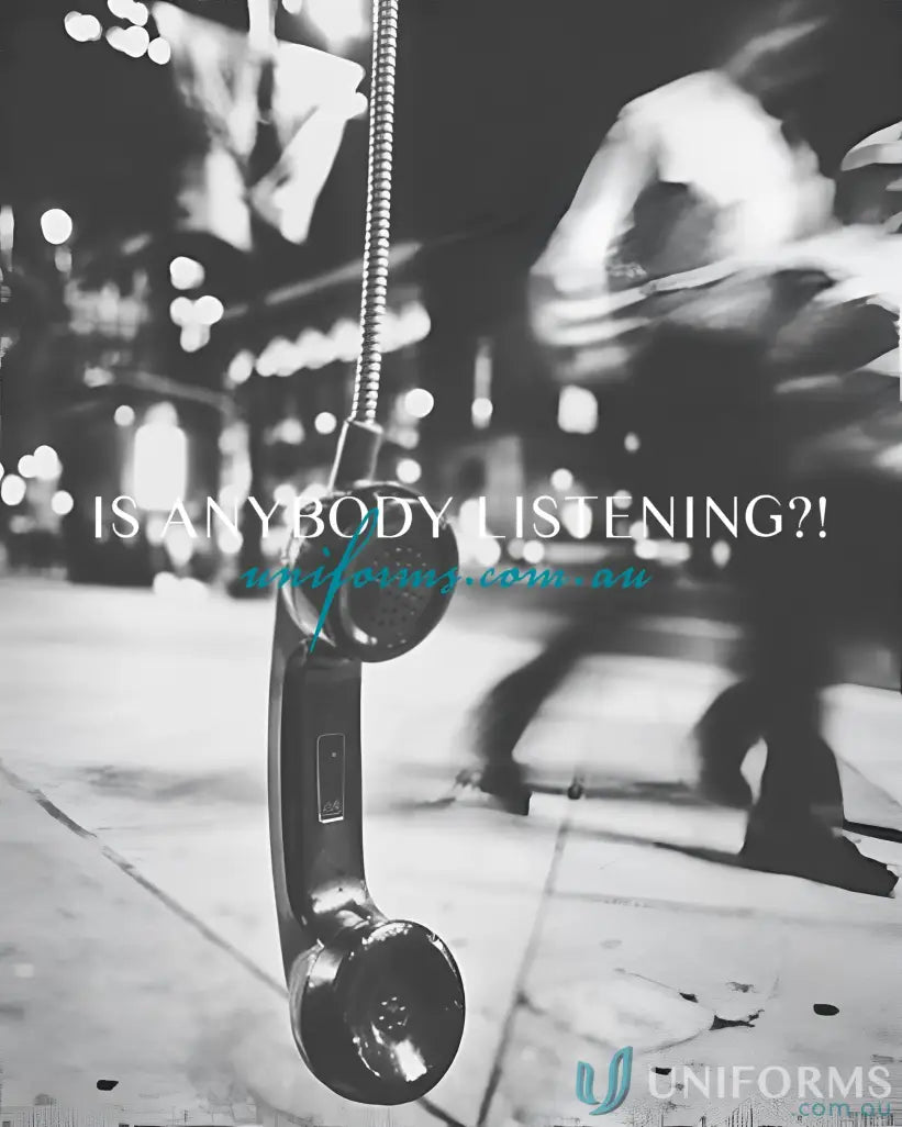 Vintage-style telephone receiver hanging by coiled cord on Yes Chef Cafe Short Apron in biz collection