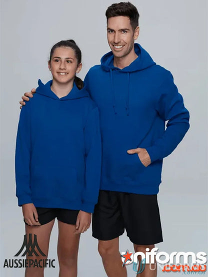 Two people wearing matching blue Torquay Youth Hoodies with low-pill fabric and tie cord closure