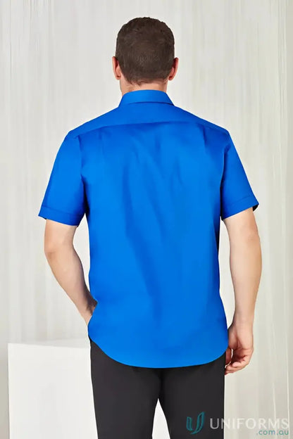 Man wearing a bright blue YR Mens EMB SS Shirt, perfect monaco short sleeve shirt offers