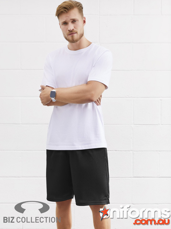 A man wearing a white T-shirt and black shorts from Biz Collection's BIZ COOL line, showcasing a casual summer look.