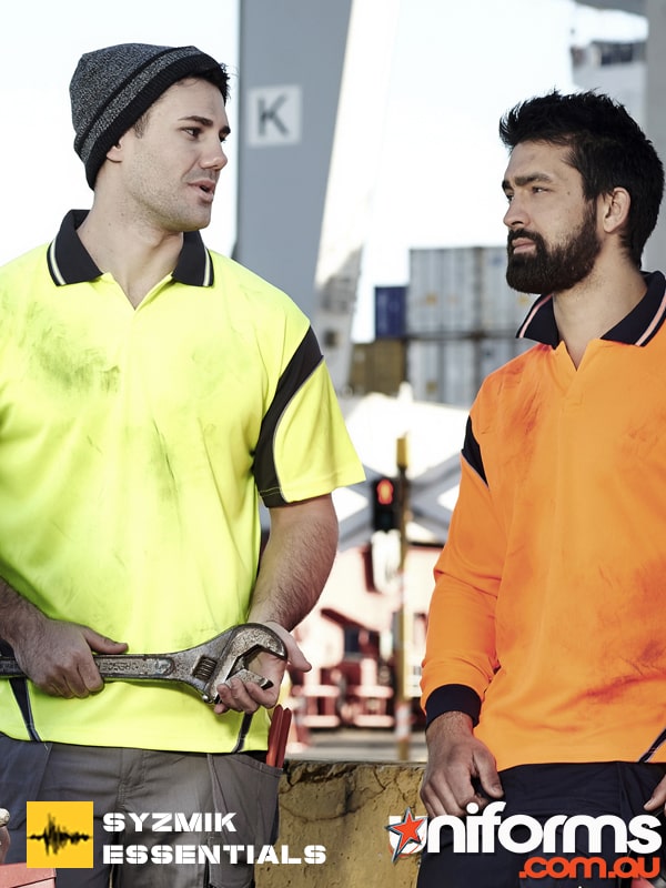 ZH248_syzmik_ESSENTIALS__1552458561_973.jpg A man in a orange and another man in yellow work polo, showcasing the Hi Vis Aztec Short Sleeve Polo ZH248.