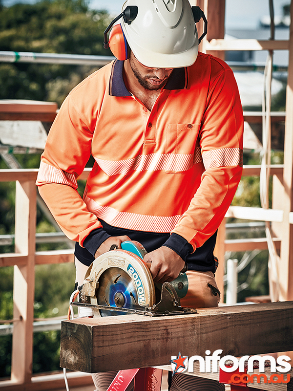 ZH530_a_Syzmic_Workwear_Uniforms__1730067807_247.jpg A man in an orange Syzmic Hi Vis segmented polo, style code ZH530 is engaged in cutting with a circular saw.