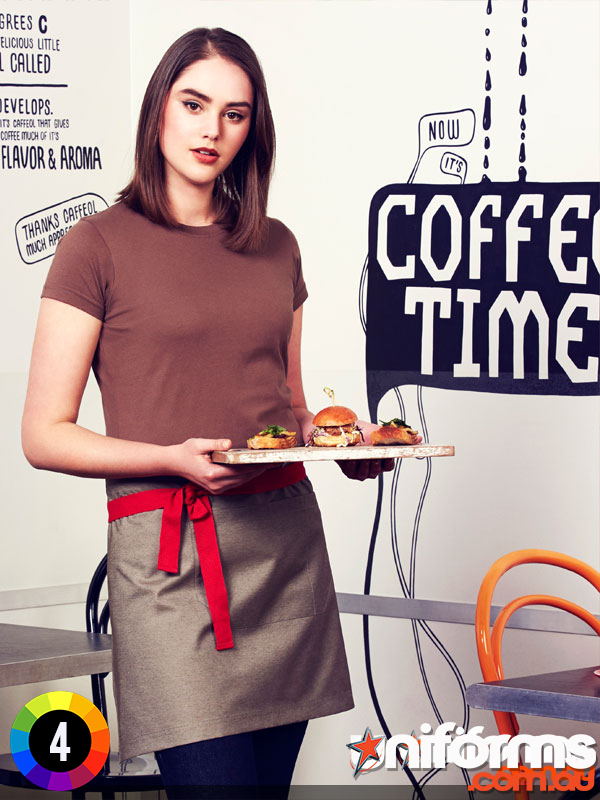 A woman in a Biz Collection Yes Chef! Urban Half Apron BA54 holds a tray of food, showcasing her culinary skills.