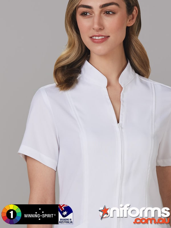 Winning Spirit Ladies Full Zip Front Tunic (M8636S) by Uniforms and Workwear. This stylish and functional tunic is perfect for professionals seeking quality uniforms and workwear.