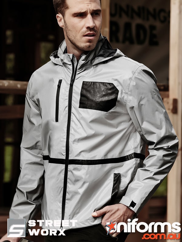 A man showcasing the SyzmikUnisex Streetworx Reflective Waterproof Jacket ZJ380.