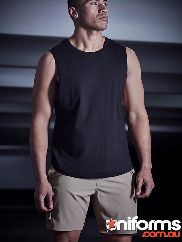 A man wearing a black tank top and khaki shorts, showcasing Syzmic brand Men's Streetworx Board Short ZS240.