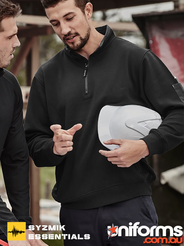 Two men in hard hats showcasing the Syzmic Unisex qrt Zip Brushed Fleece Pullover ZT366